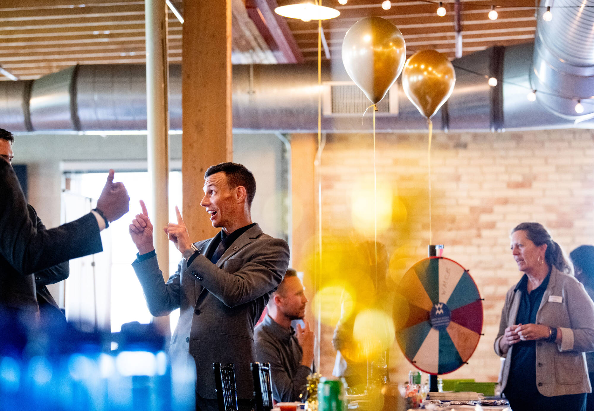 People celebrating in a small business.